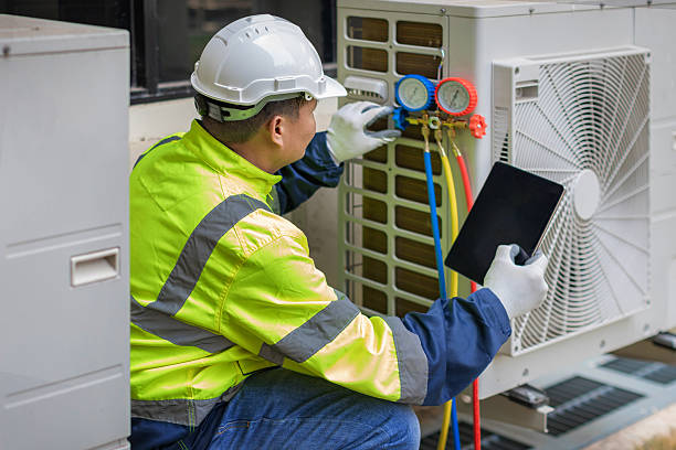 Professional Air Conditioning Repair technician working in East Wareham, MA